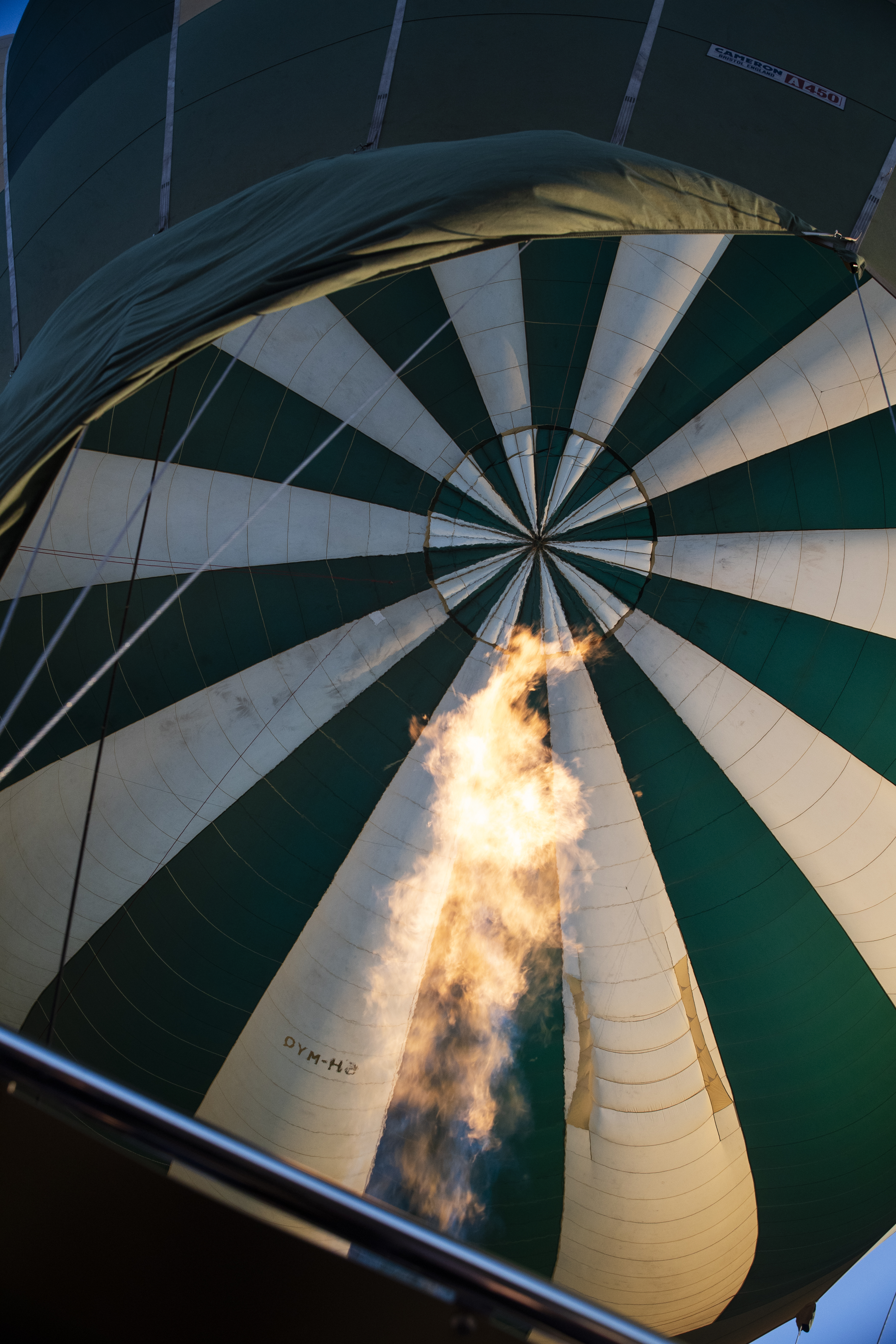 a hot air balloon with a flame