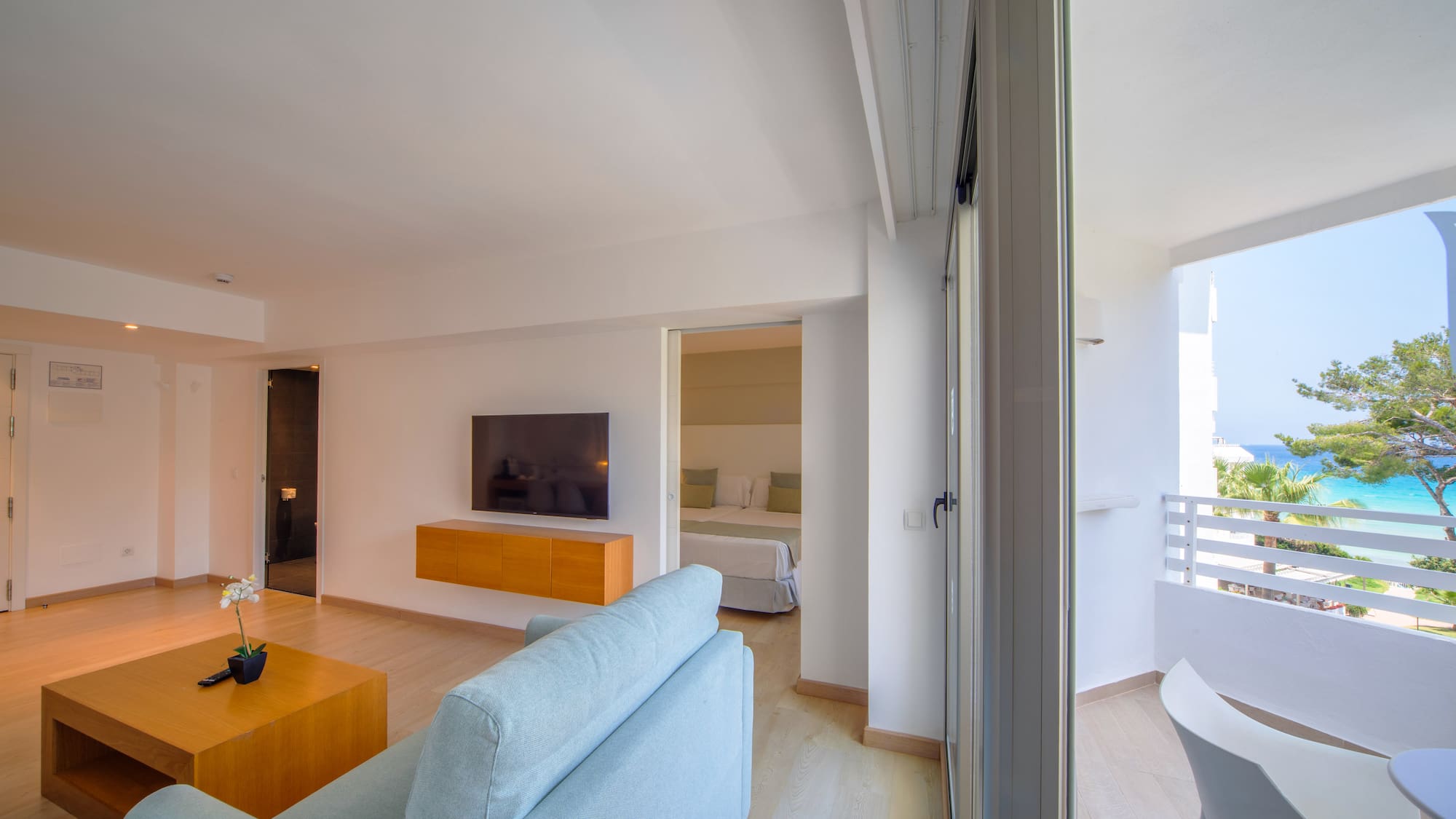 a living room with a tv and a couch