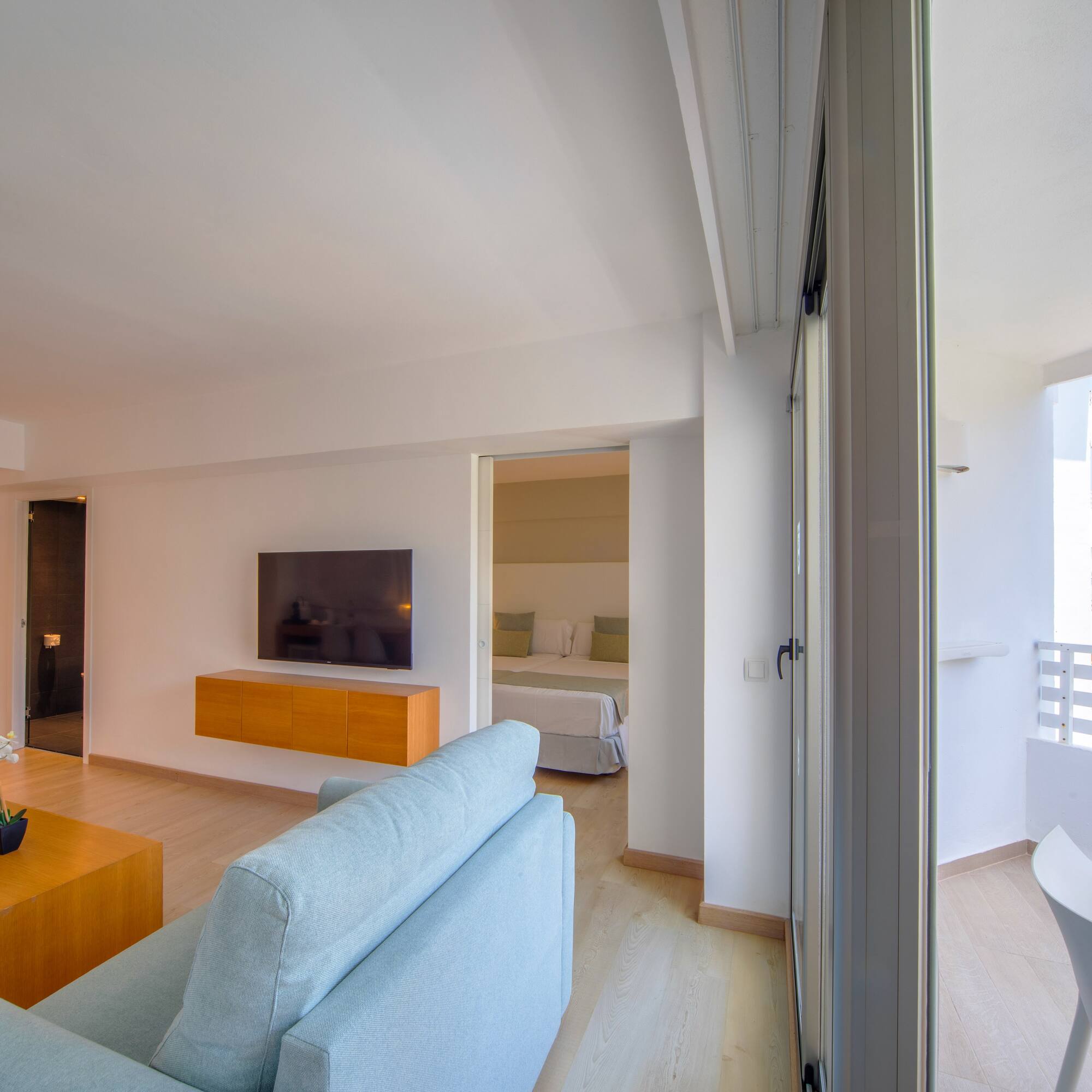 a living room with a tv and a couch