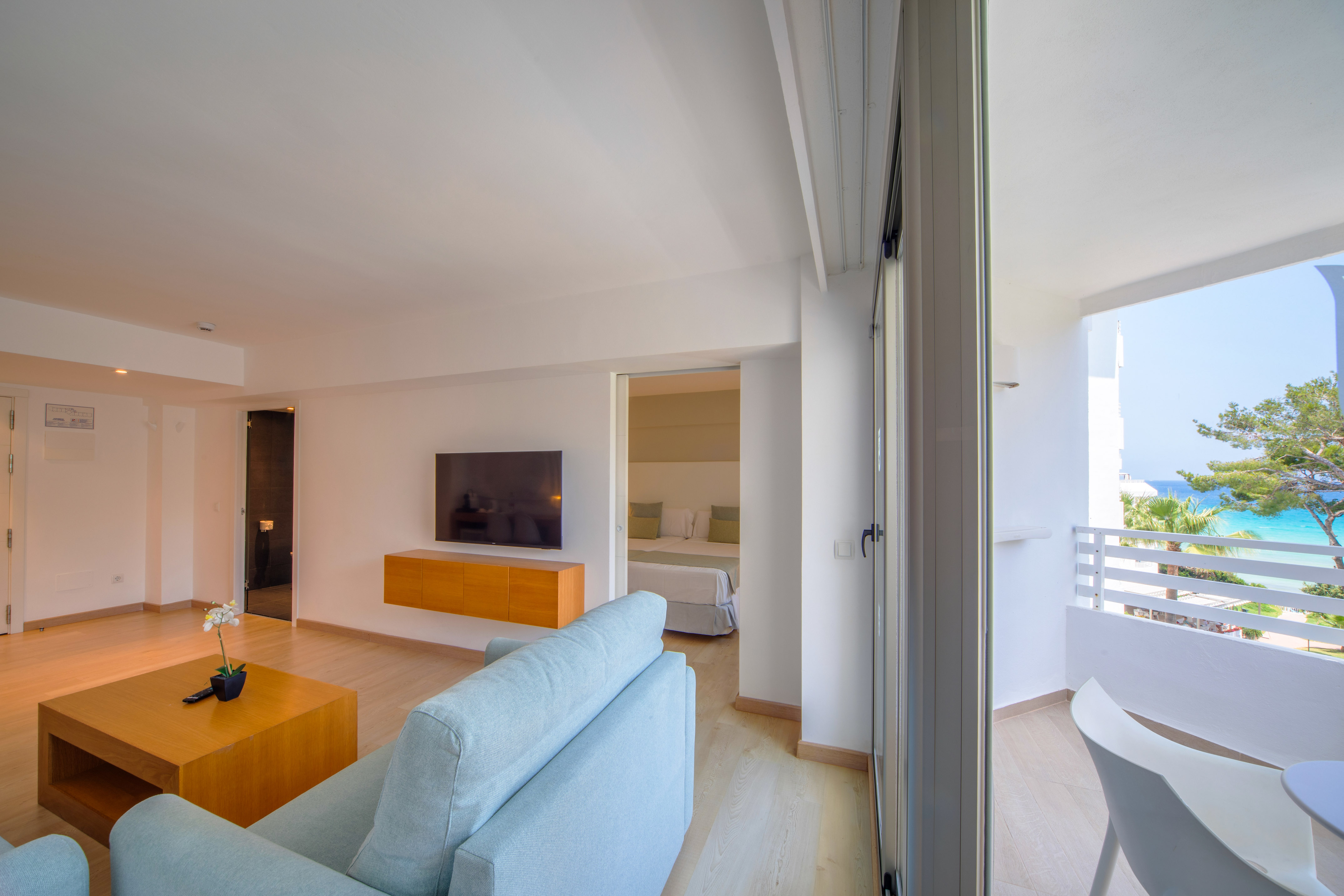 a living room with a tv and a couch