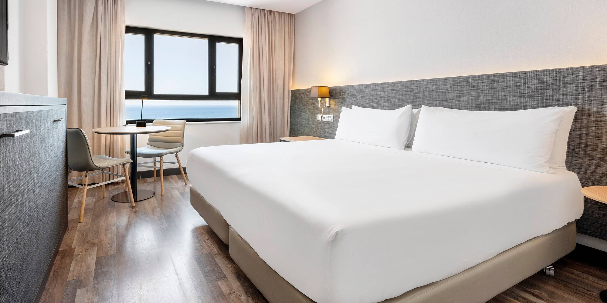 a room with a bed and a table