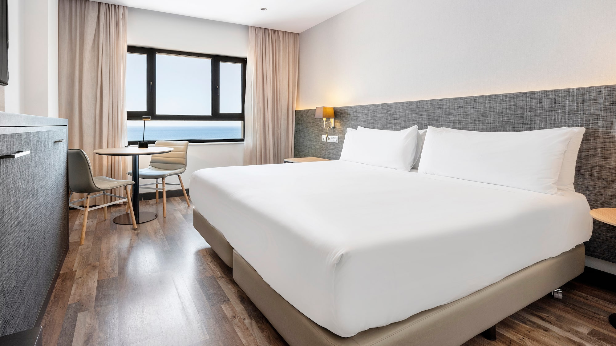 a room with a bed and a table