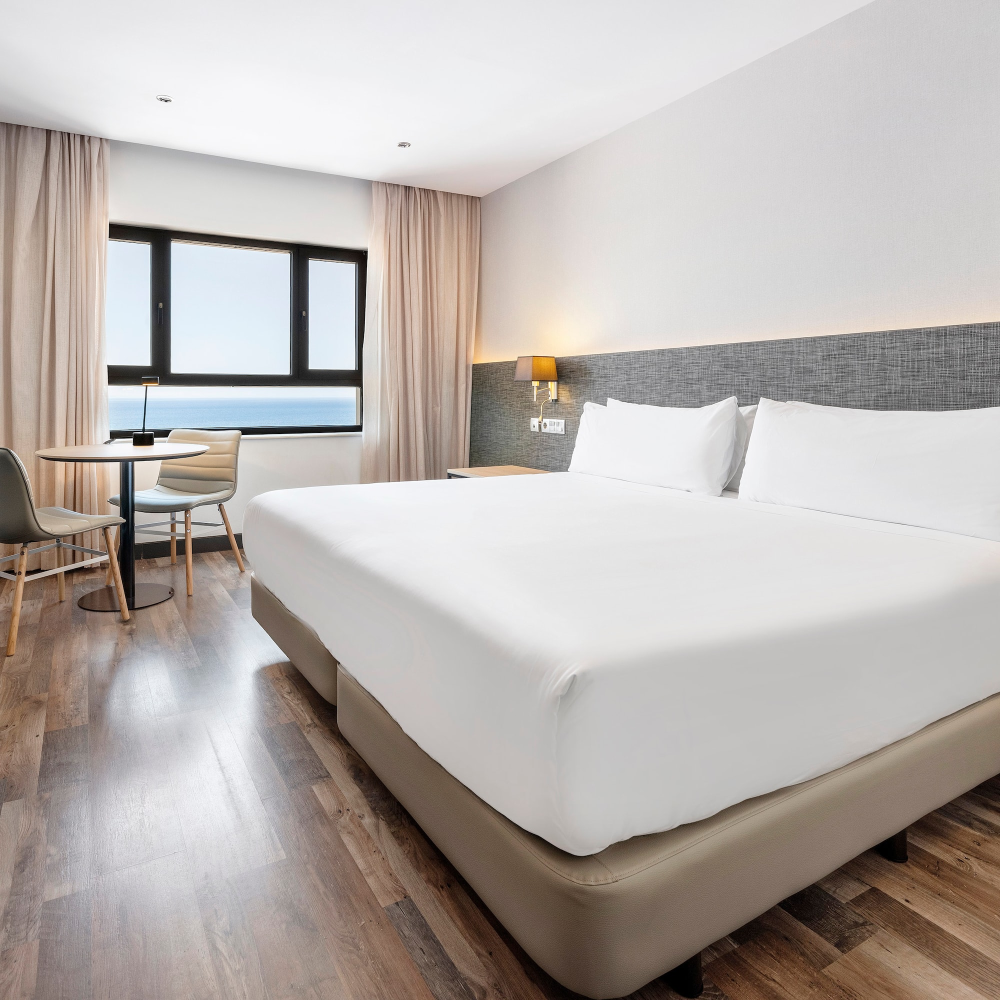 a room with a bed and a table