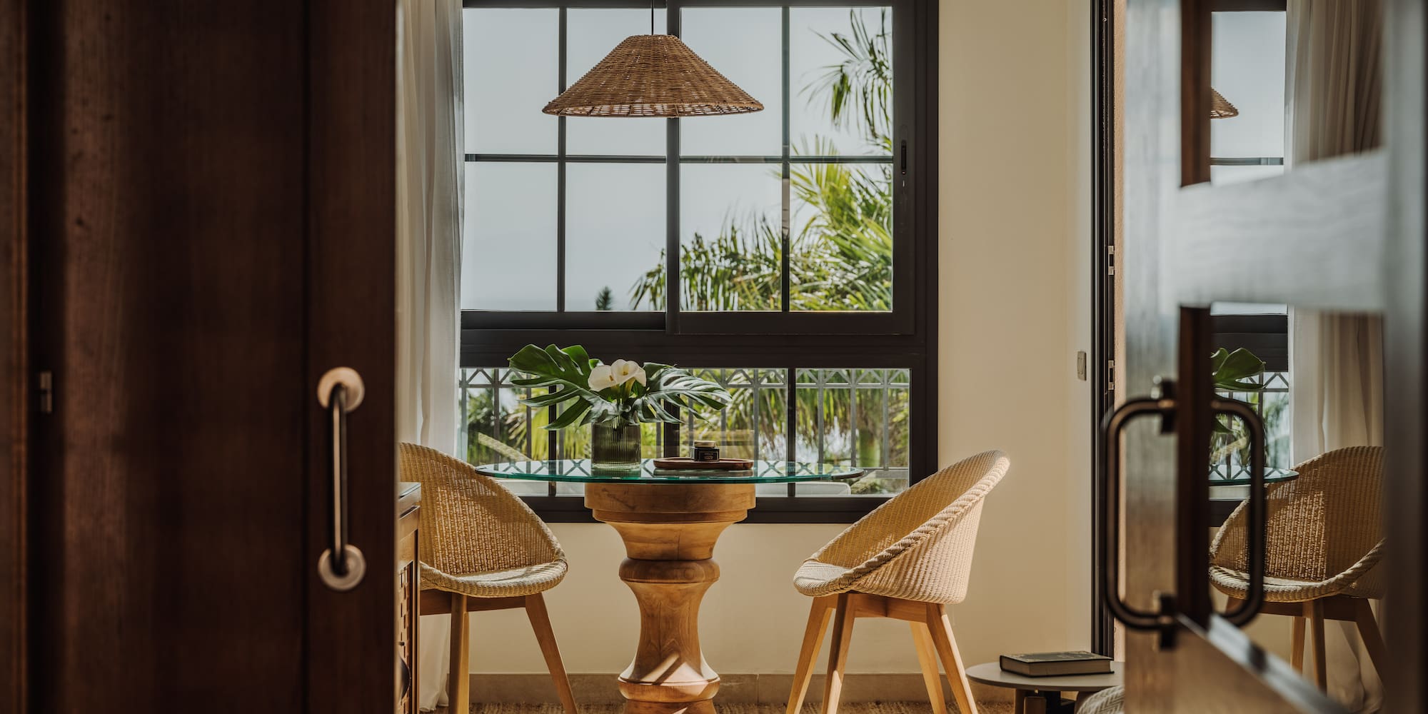 a room with a table and chairs