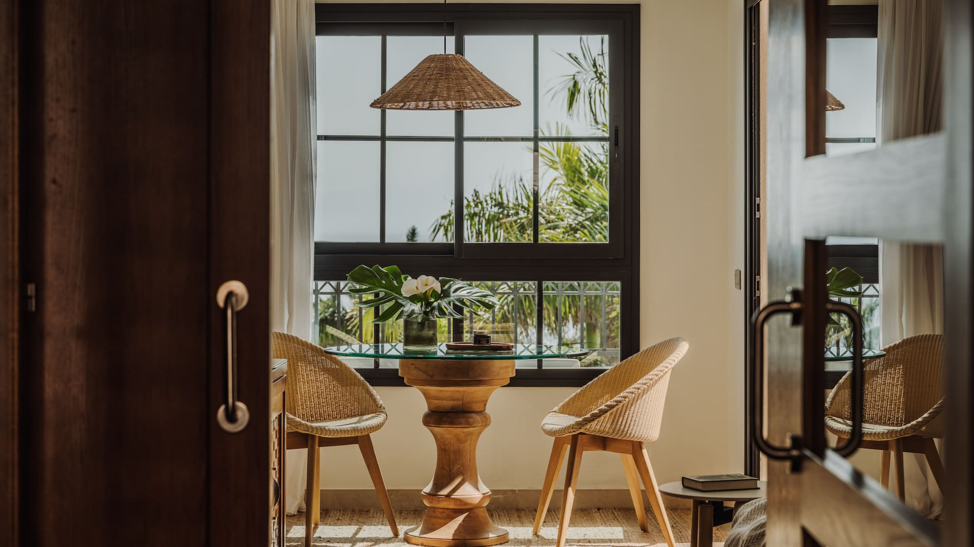 a room with a table and chairs