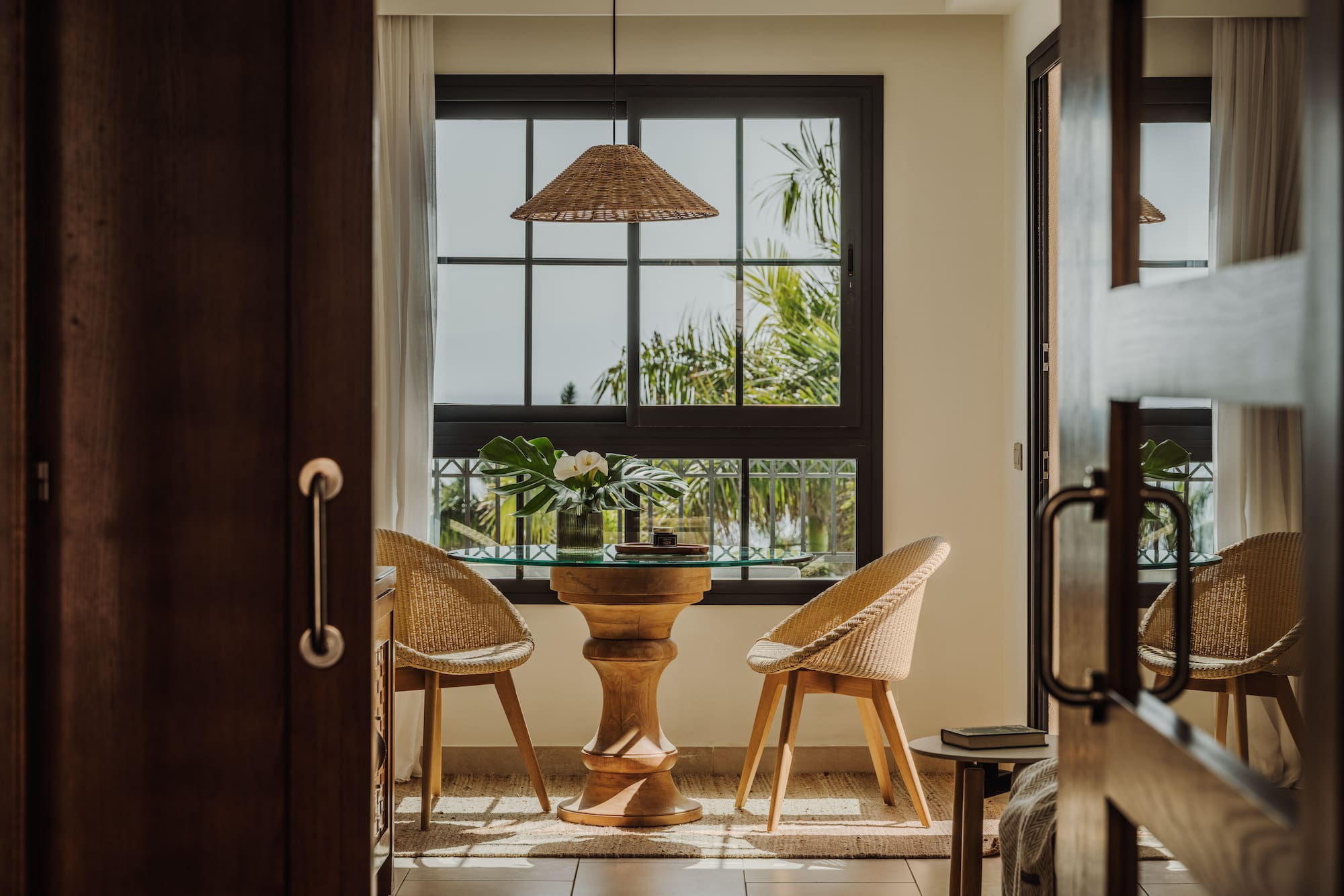 a room with a table and chairs
