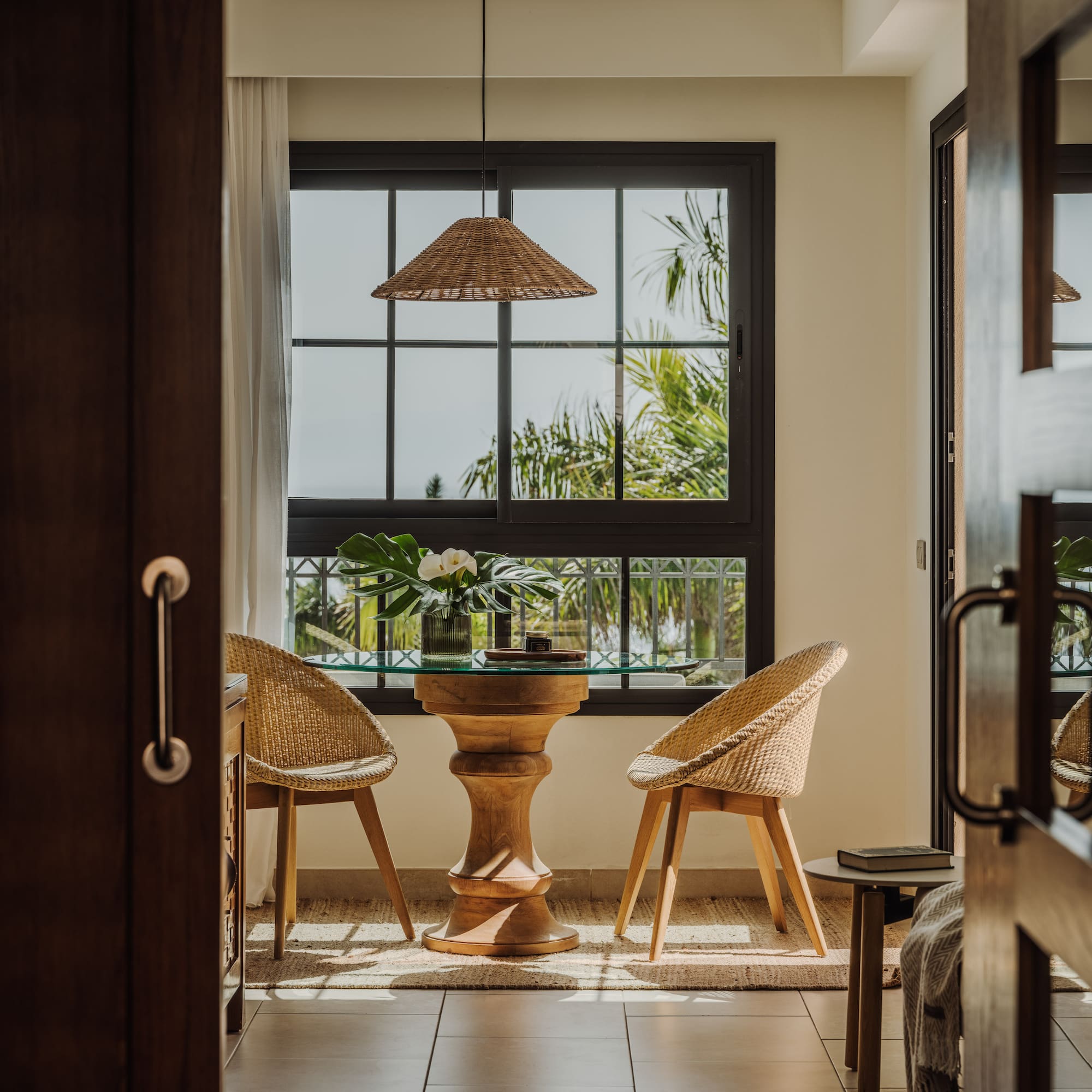 a room with a table and chairs
