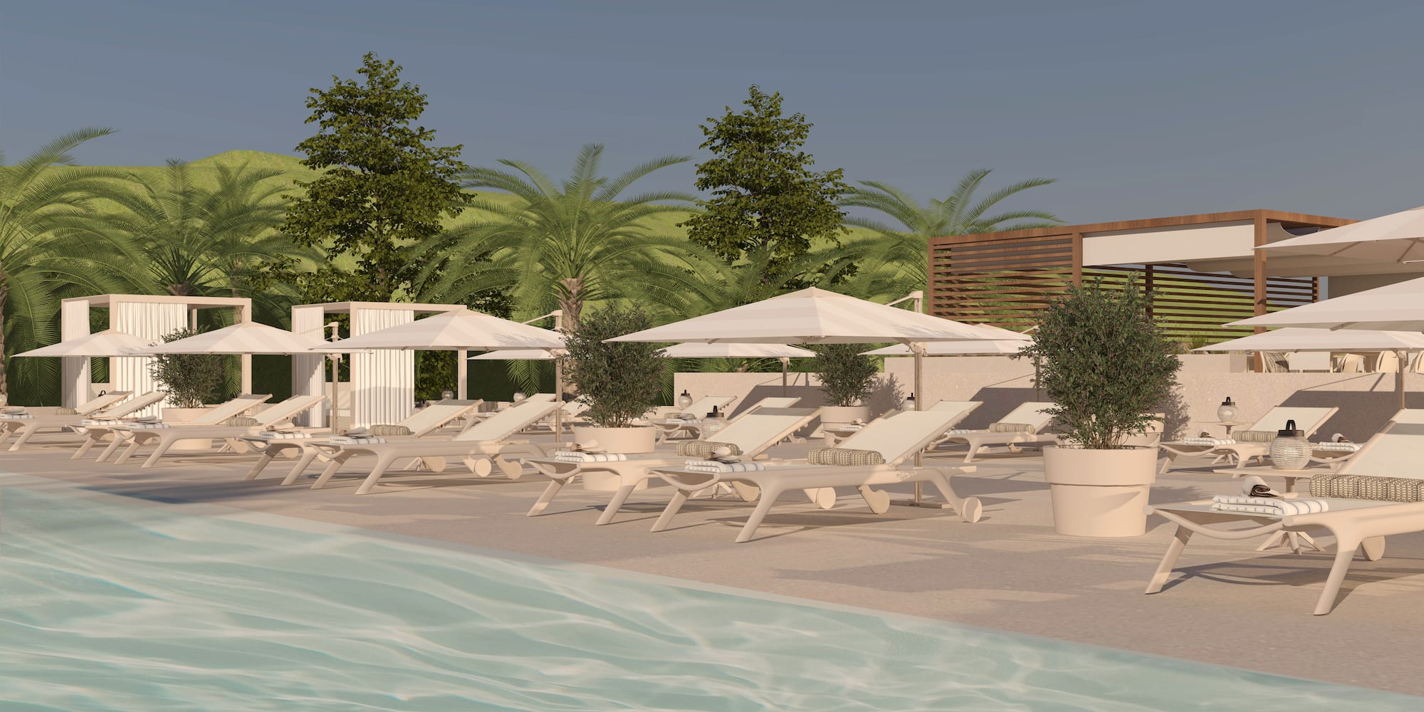 Tumbonas blancas y sombrillas junto a la piscina de un resort. - Hotel Golf Santa Ponsa Meliá Collection, Mallorca