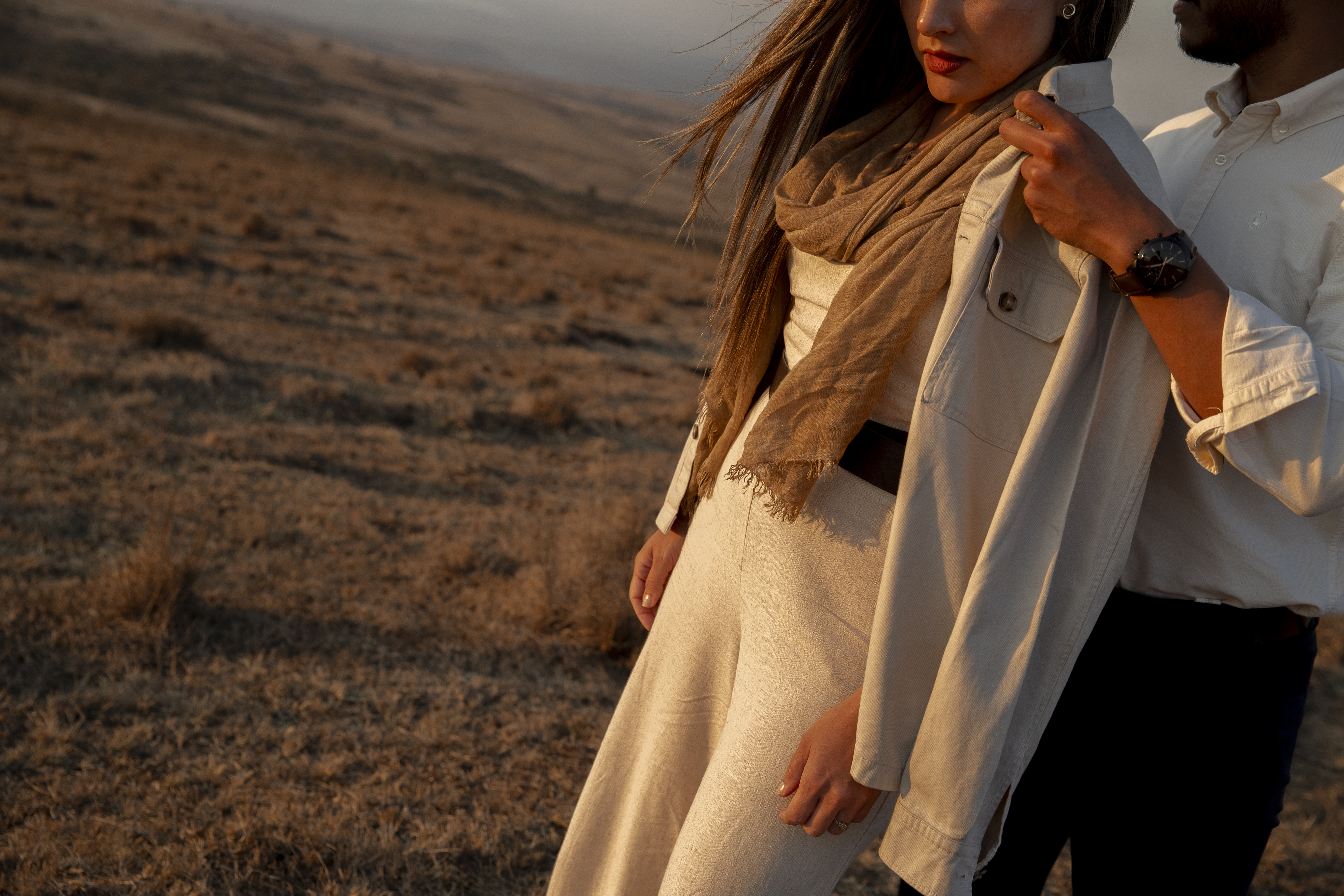 a woman standing in a field