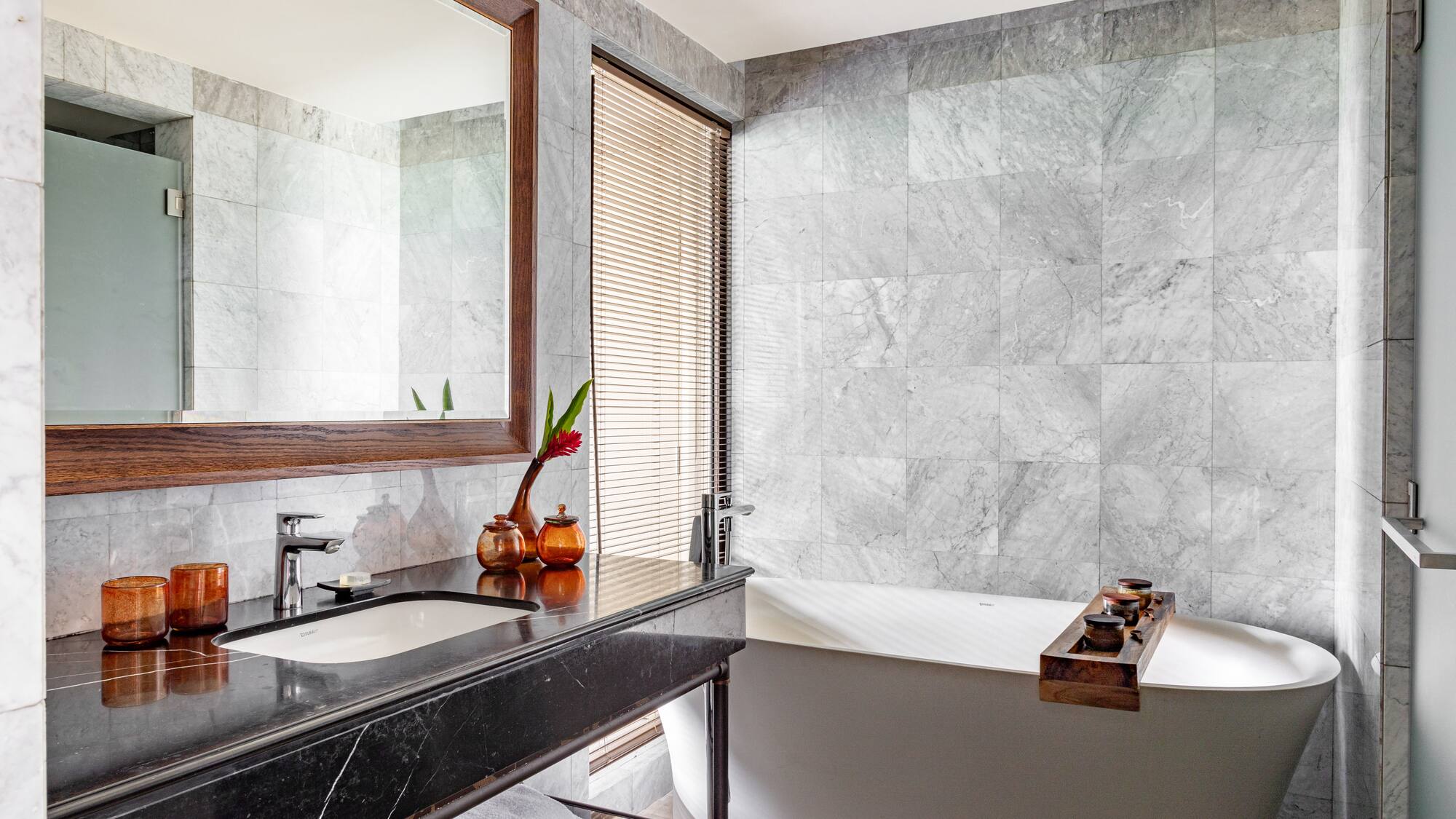 a bathroom with a bathtub and sink