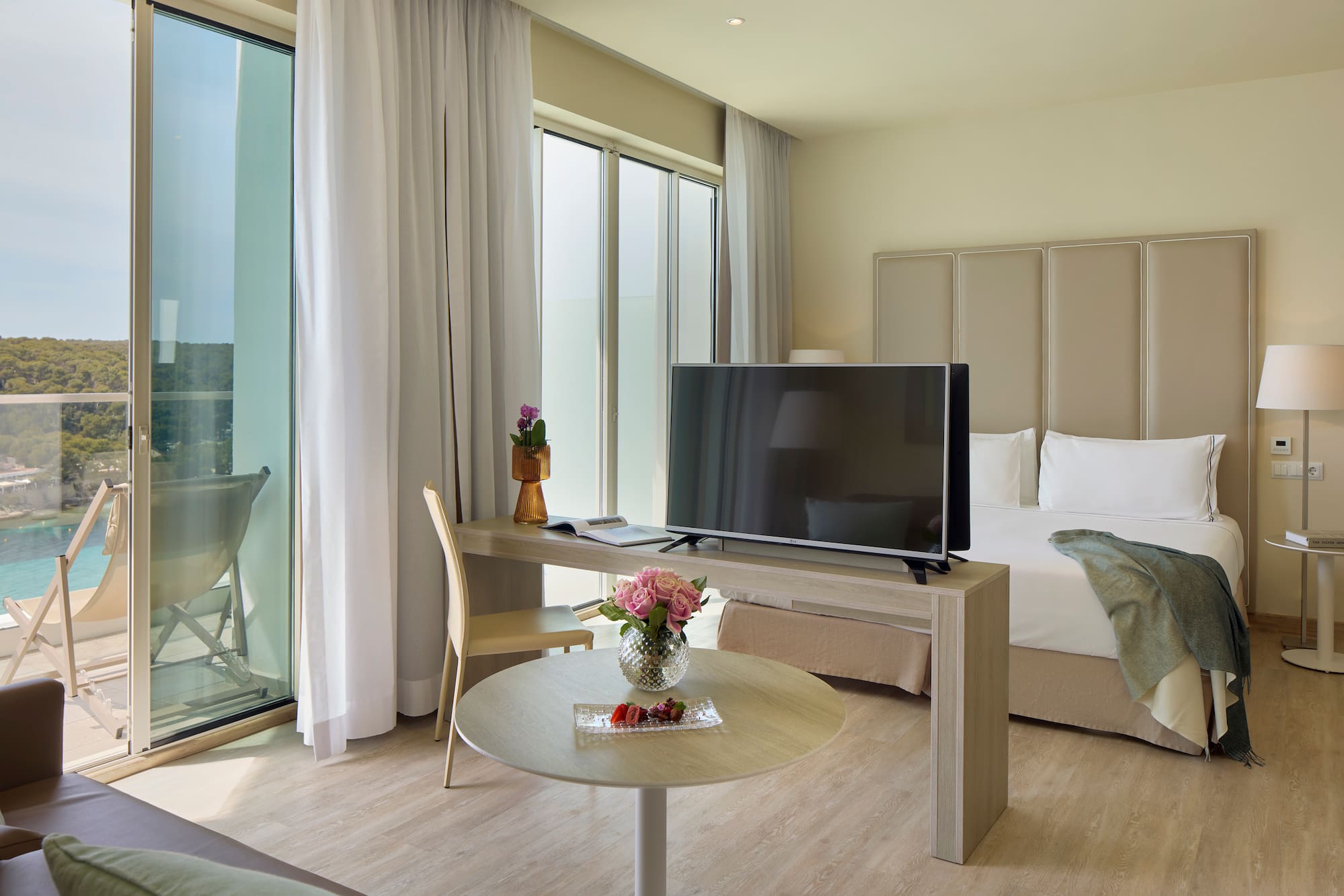 a room with a television and a table