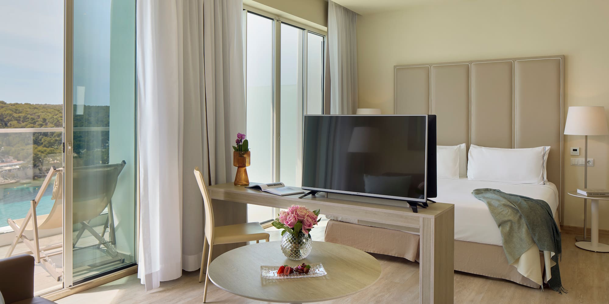 a room with a television and a table