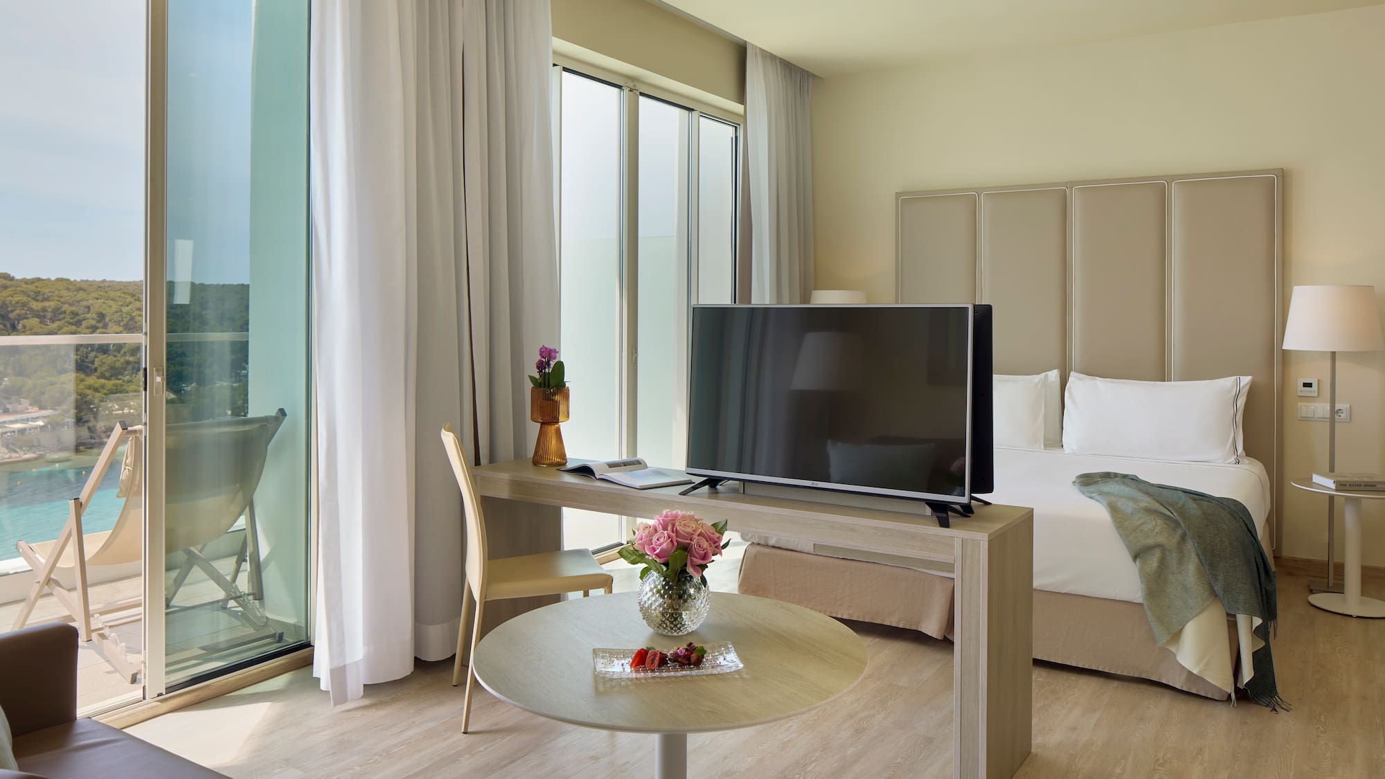 a room with a television and a table