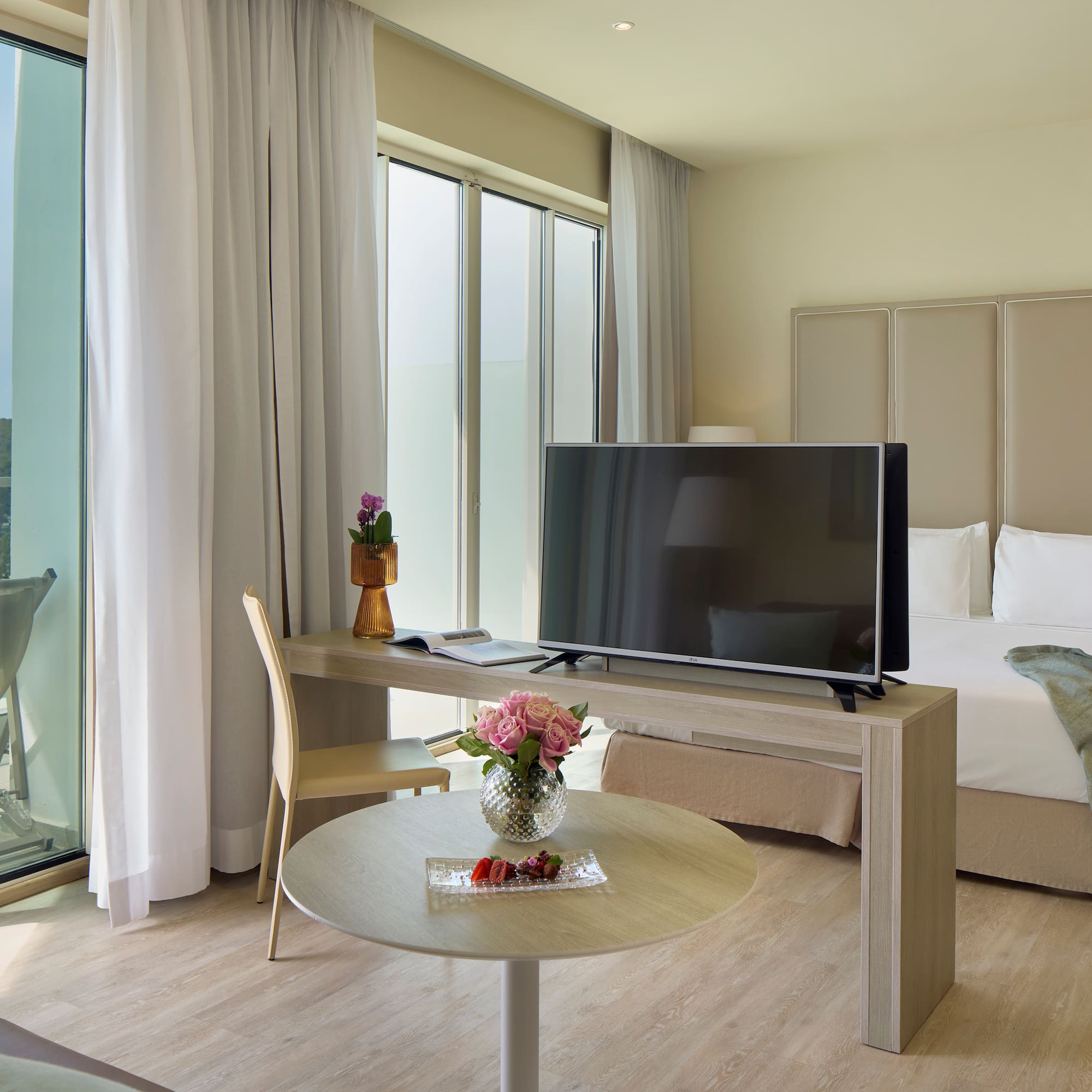 a room with a television and a table