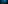 Freediving duo in dark ocean, swimming above a dense seagrass bed.