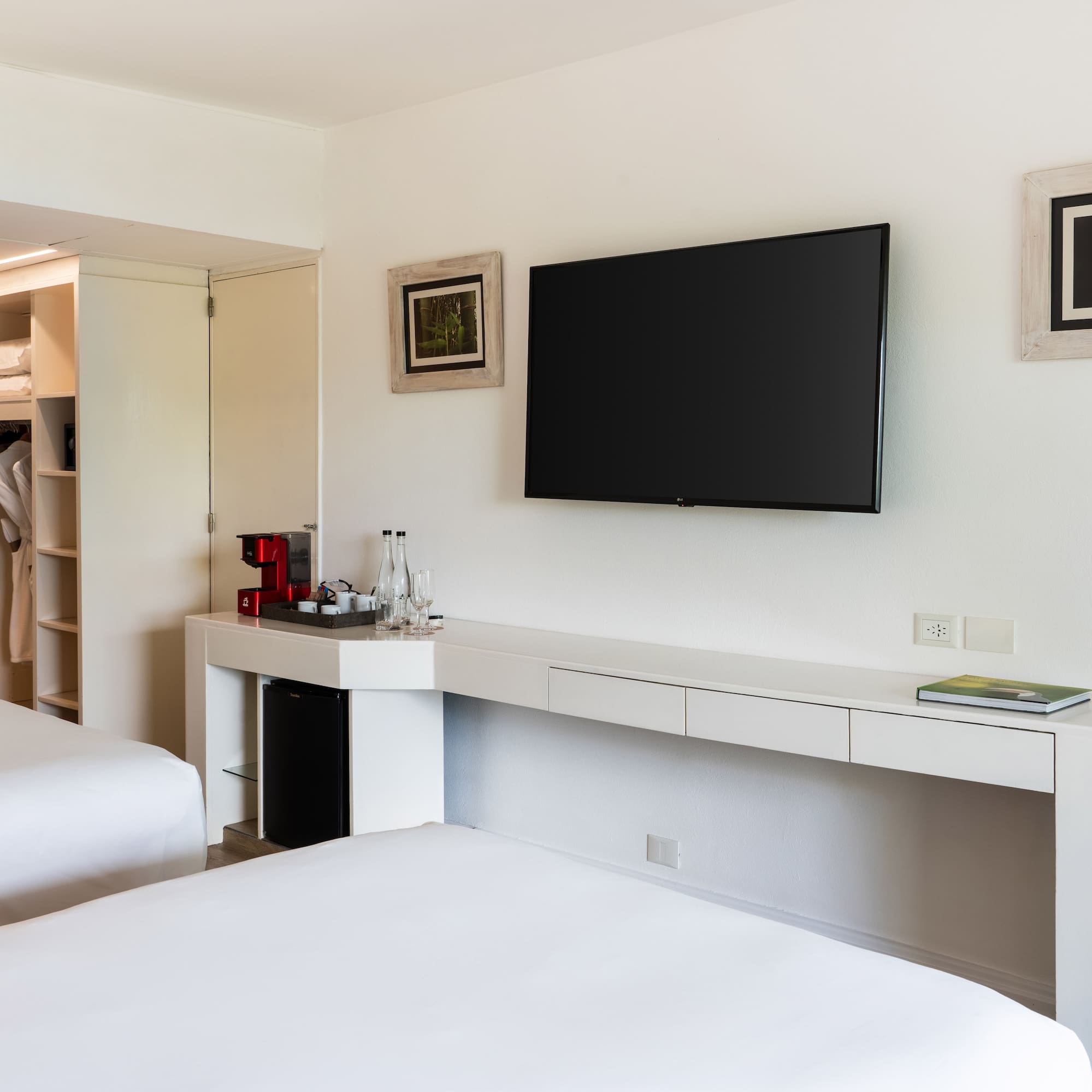 a room with a television on the wall