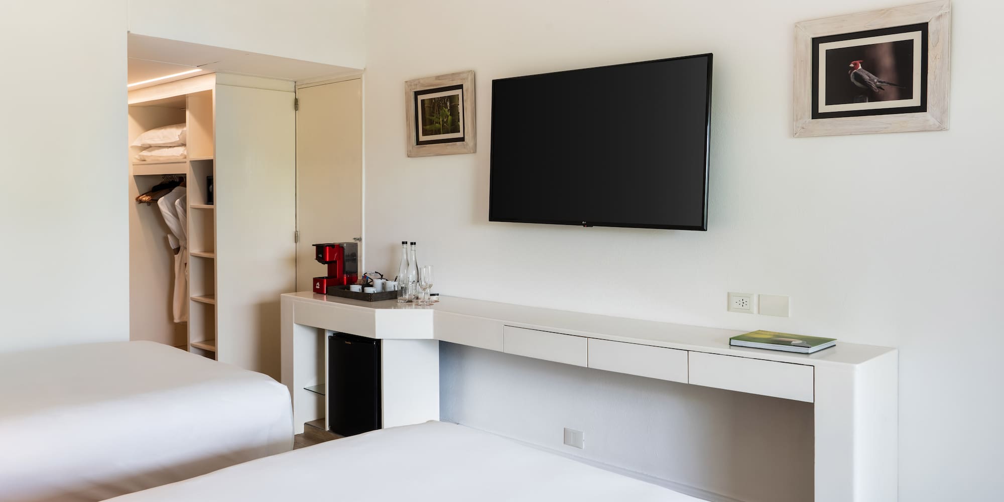 a room with a television on the wall