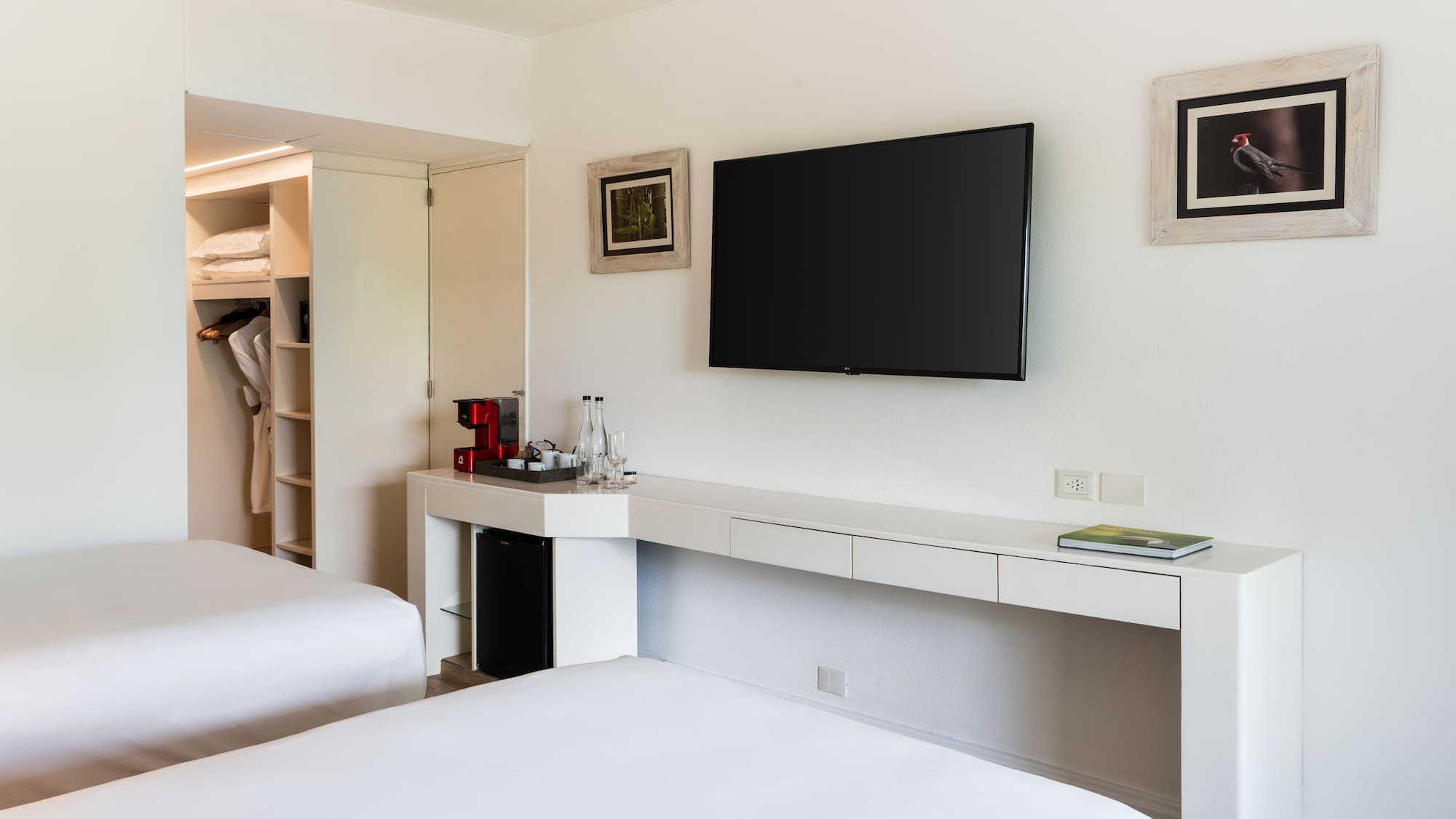 a room with a television on the wall