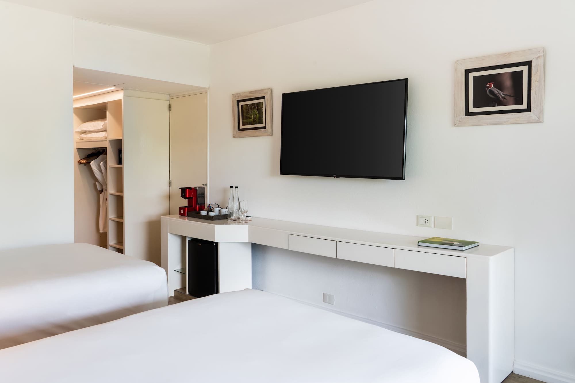 a room with a television on the wall