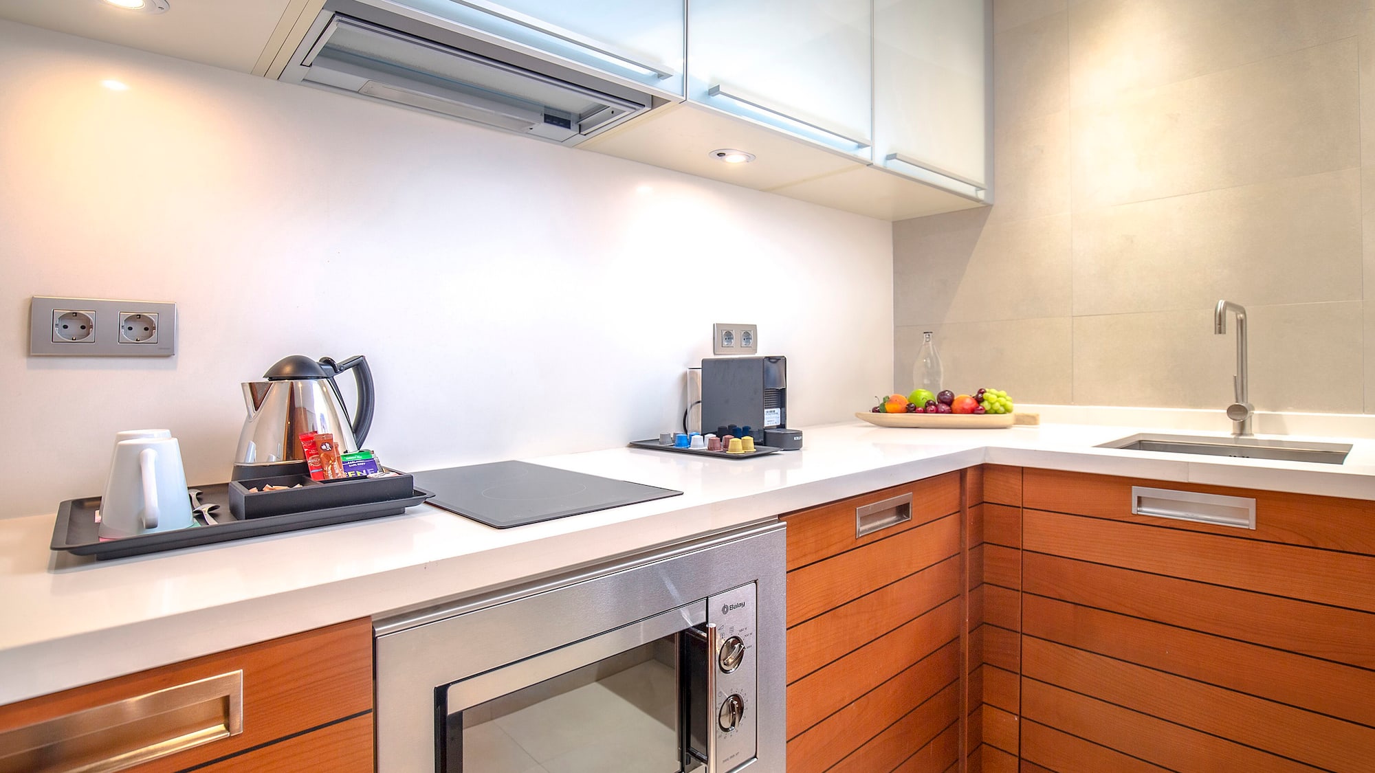 a kitchen with wood cabinets and a stove