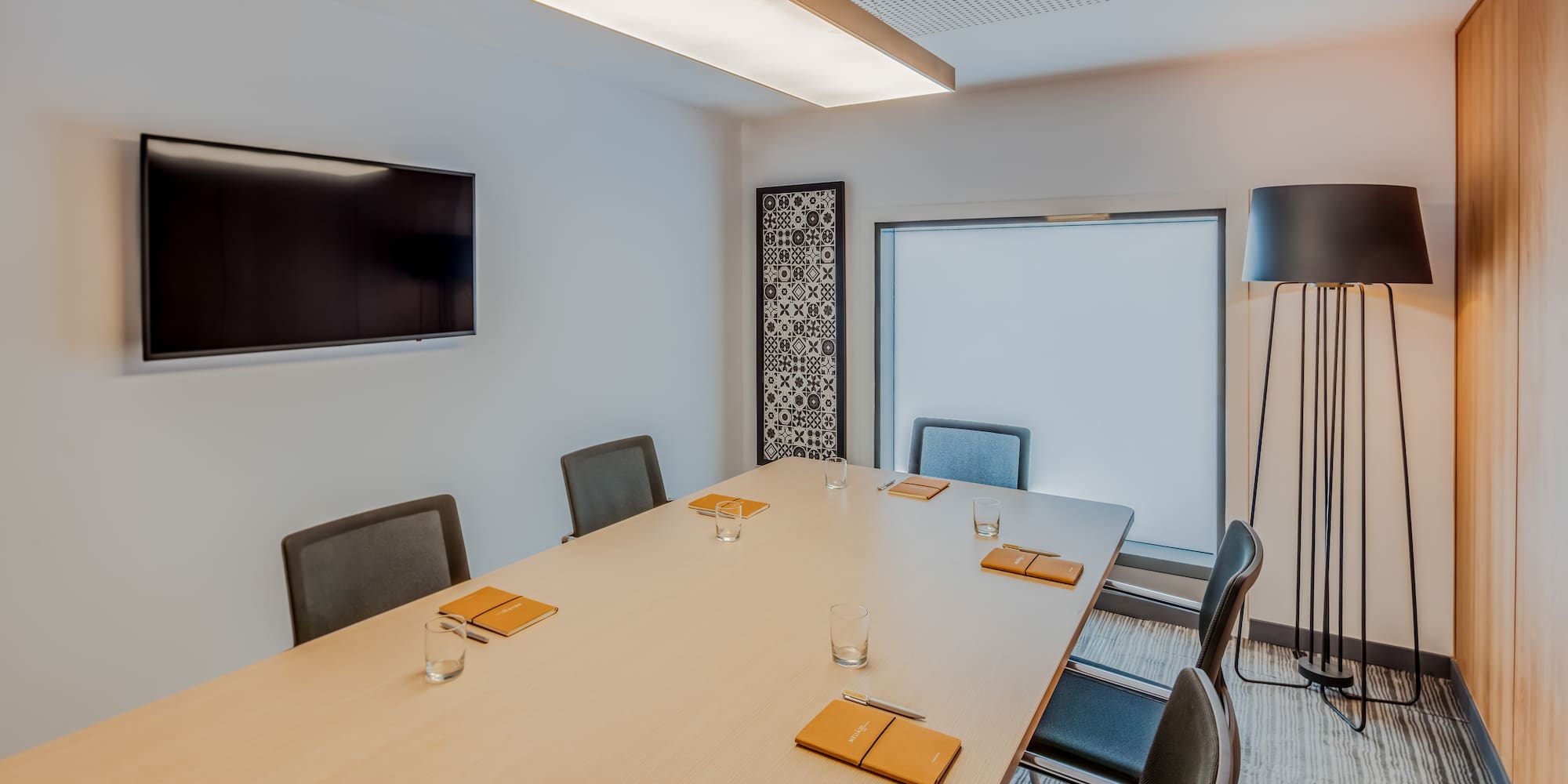 a room with a table and chairs