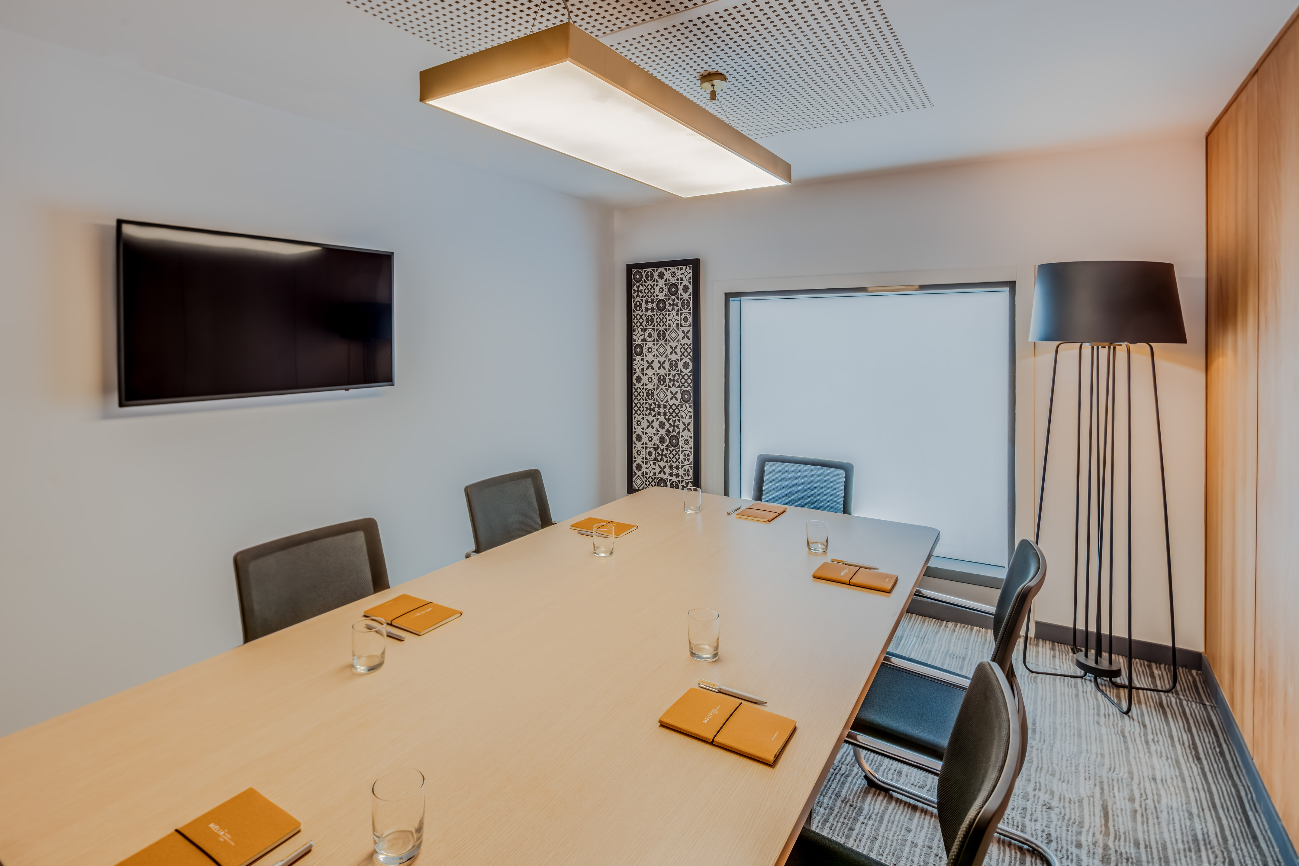 a room with a table and chairs