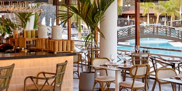 a restaurant with tables and chairs