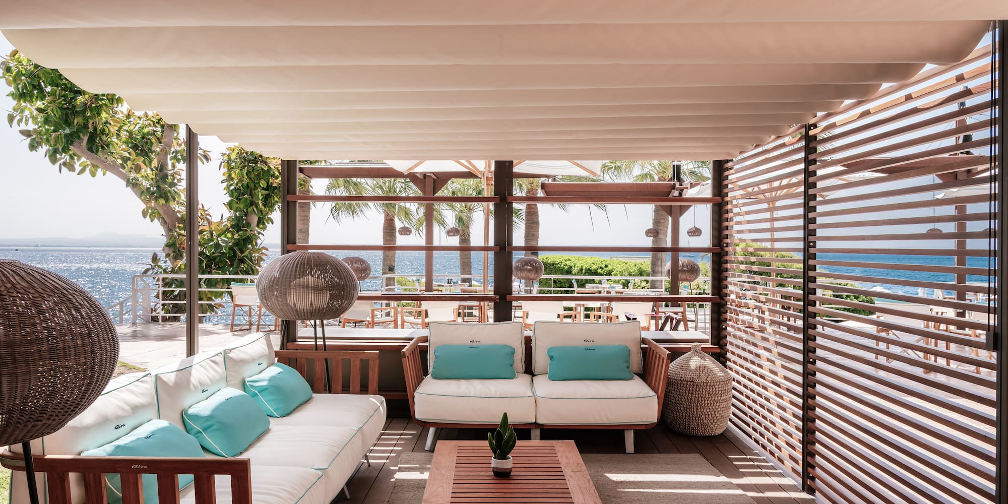 a patio with a couch and a table