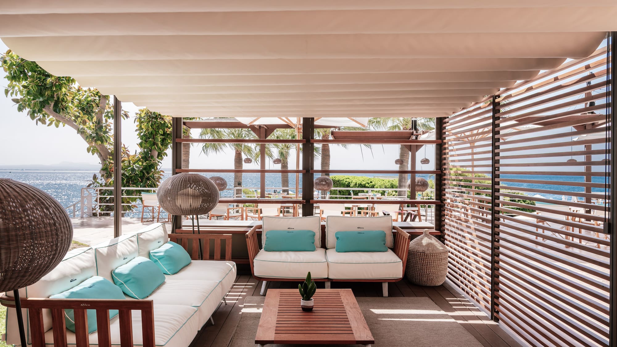 a patio with a couch and a table