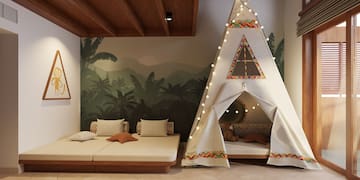 a room with a teepee bed and a bed and a bed