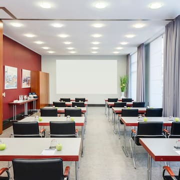 a room with tables and chairs