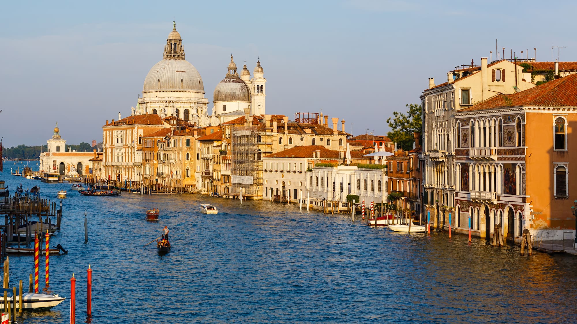 a water way with buildings and boats on it