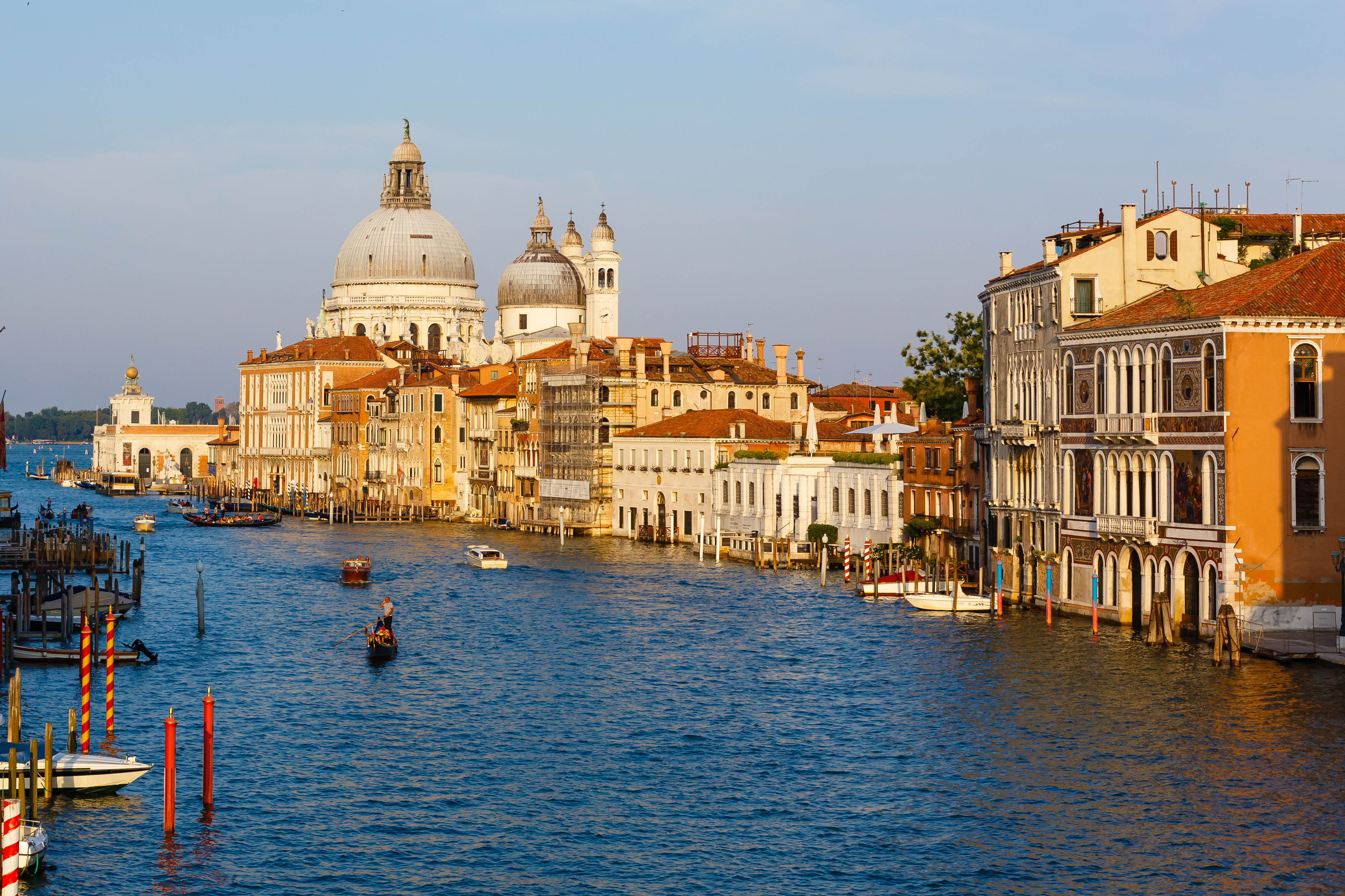 a water way with buildings and boats on it