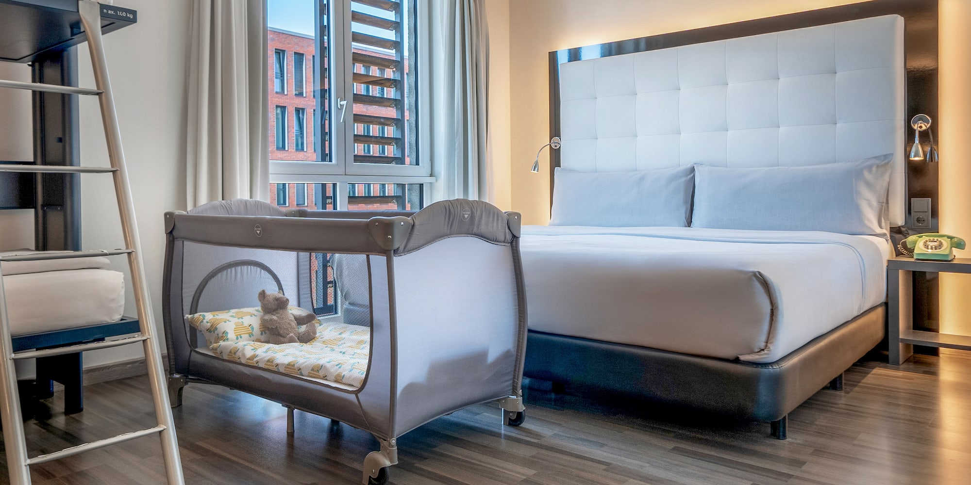 a bed and crib in a room