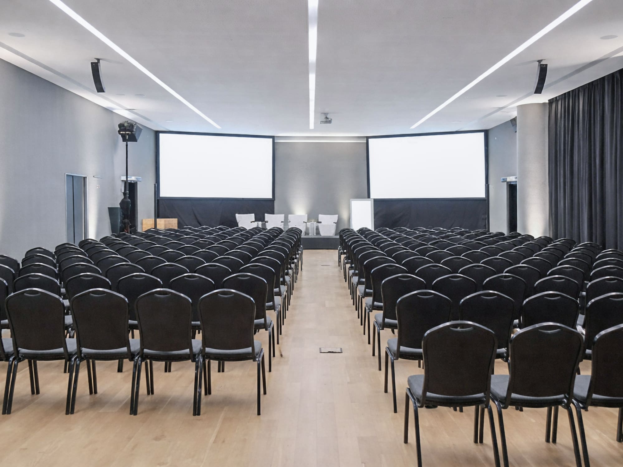 a large room with rows of chairs