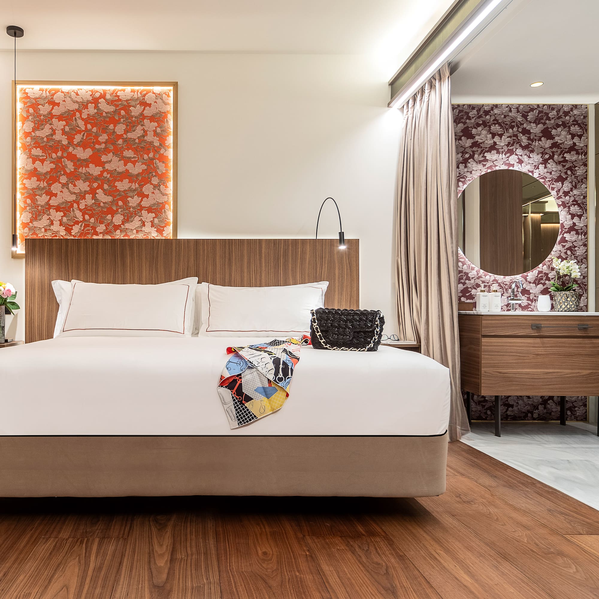 a bedroom with a bed and a mirror