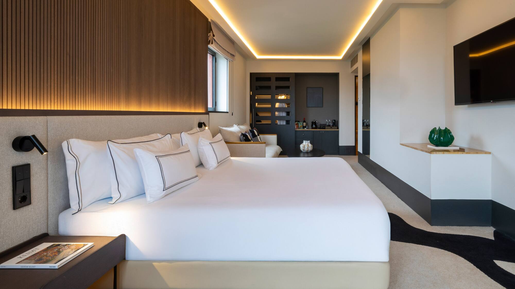 a bedroom with a bed and a counter