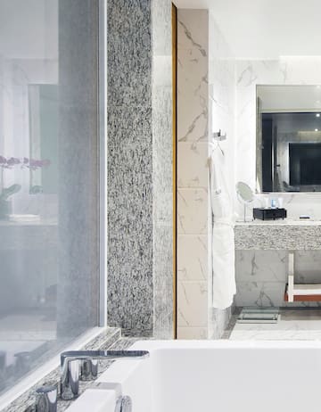 a bathroom with a sink and mirror