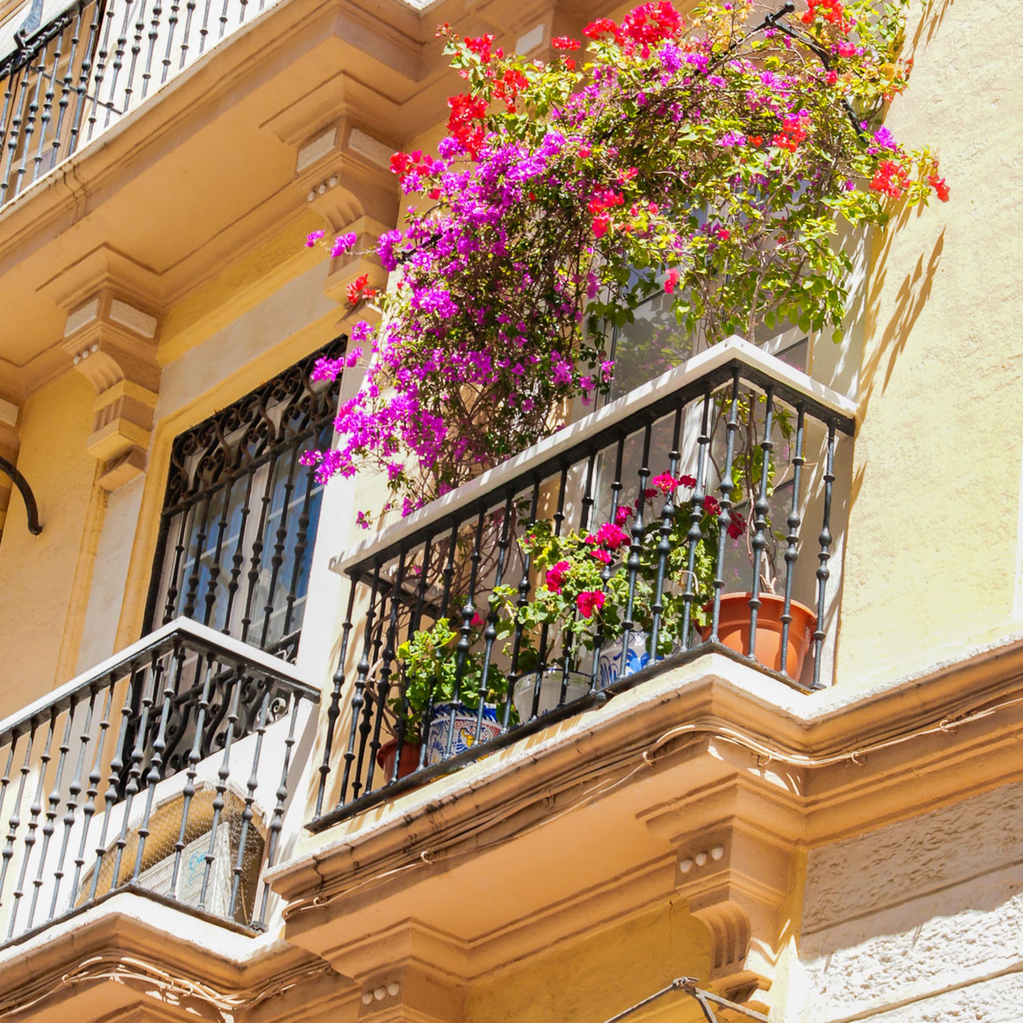 a balcony with flowers on it