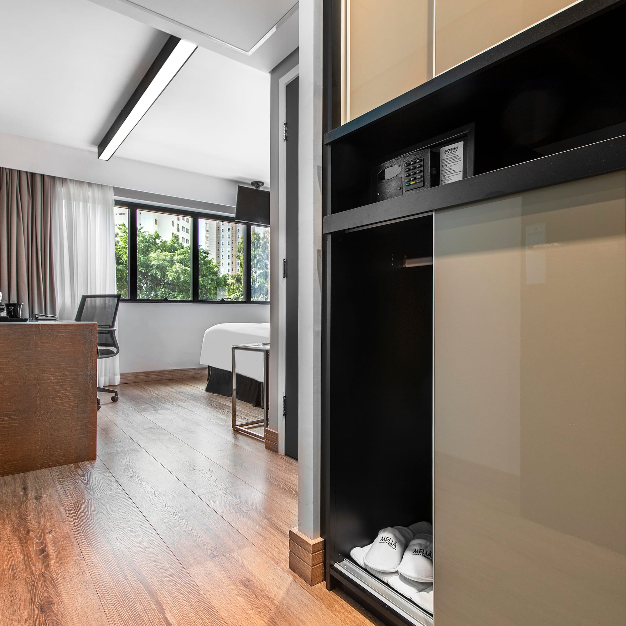 a room with a closet and a bed