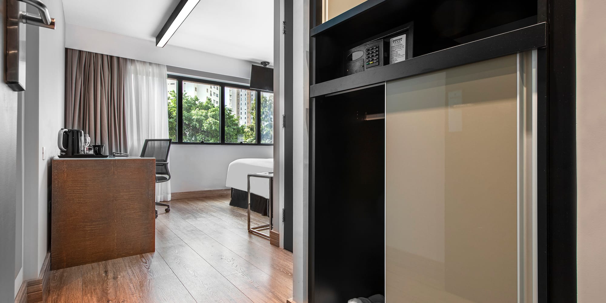 a room with a closet and a bed