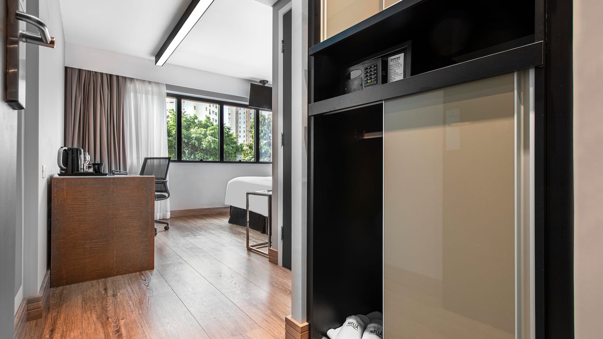 a room with a closet and a bed