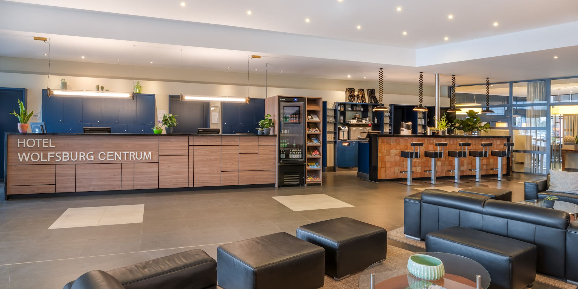 a lobby with a bar and a counter