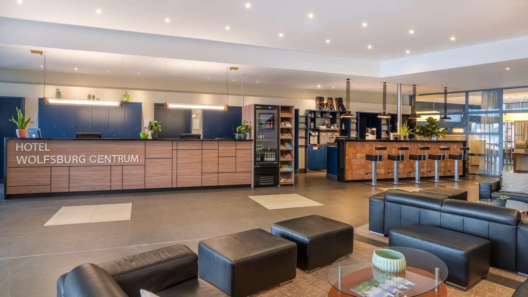 a lobby with a bar and a counter