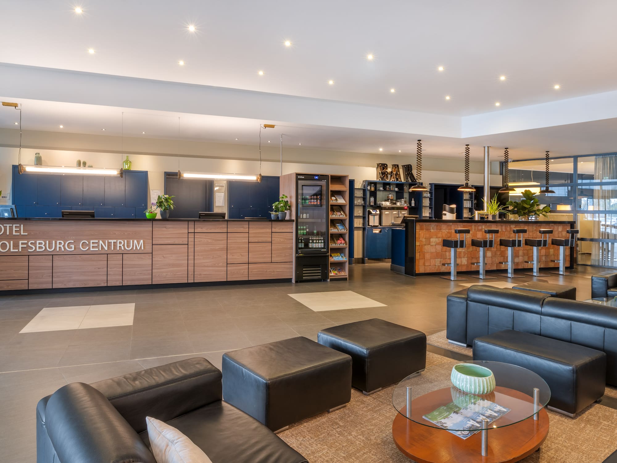 a lobby with a bar and a counter