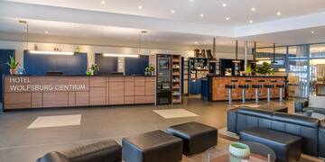 a lobby with a bar and a counter