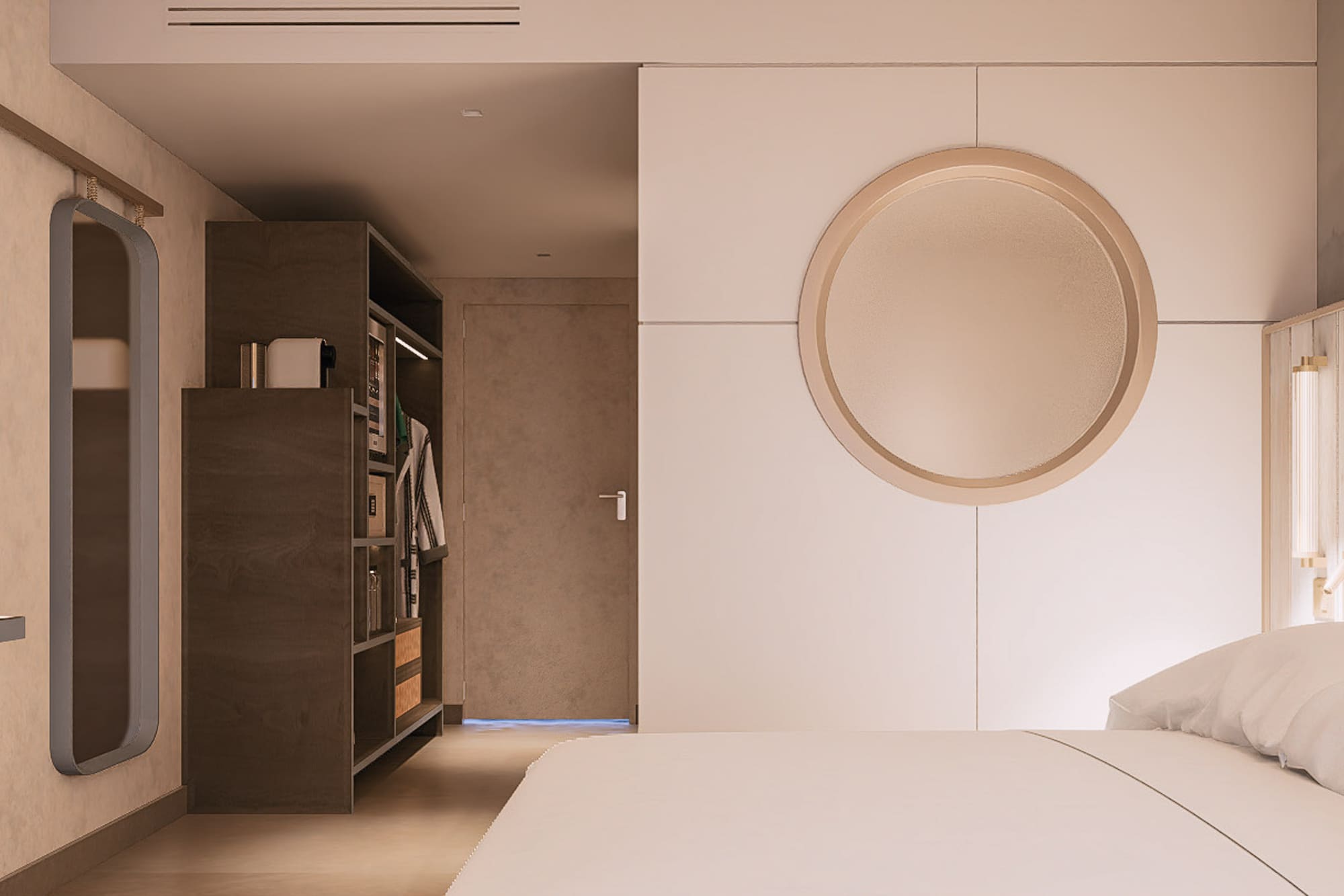 a room with a round mirror