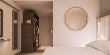 a room with a round mirror