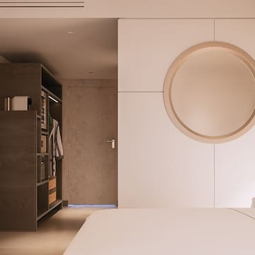 a room with a round mirror