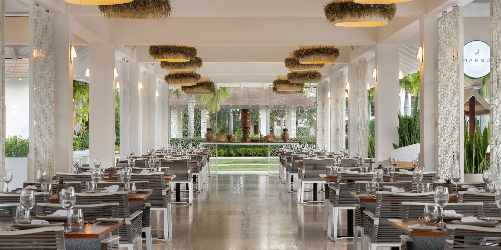 a restaurant with tables and chairs